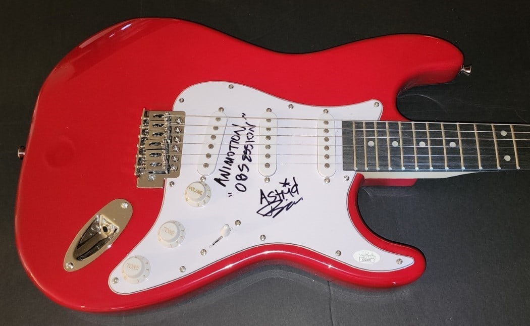 Authentic Astrid Plane Bill Wadhams Signed Electric Guitar Animotion JSA: Authentic Astrid Plane Bill Wadhams Signed Electric Guitar Animotion JSA This is an original electric guitar autographed by Astrid Plane and Bill Wadhams, members of the iconic band Animotion. The gui