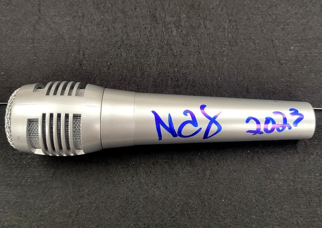 Microphone autographed by Nasir Jones with Beckett authentication holo: Microphone autographed by Nasir Jones with Beckett authentication holo This original microphone is hand-signed by rapper Nasir Jones, known as NAS. The autograph has been authenticated by Beckett and