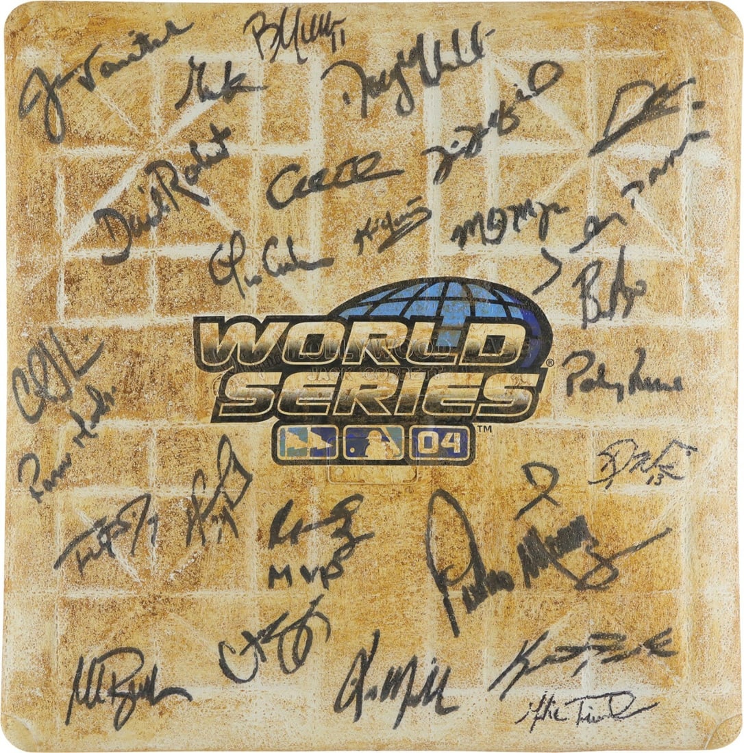 2004 Boston Red Sox Team Signed Game Used World Series Base PSA Authenticated: 2004 Boston Red Sox Team Signed Game Used World Series Base PSA Authenticated This historic 2004 Boston Red Sox World Series game-used base is a remarkable piece of memorabilia, signed by 26 members o
