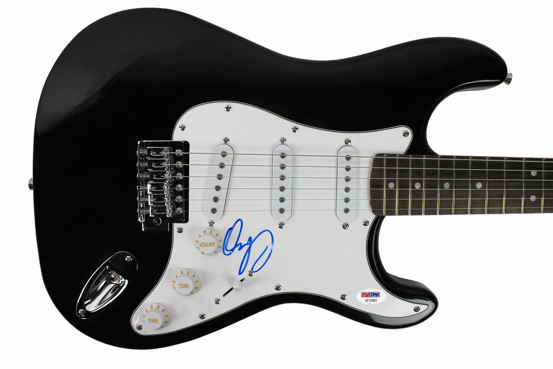 Black Electric Guitar Signed by Dennis DeYoung of Styx PSA DNA Certified: Black Electric Guitar Signed by Dennis DeYoung of Styx PSA DNA Certified This black electric guitar has been personally signed by Dennis DeYoung of Styx. The autograph is authenticated by PSA/DNA and
