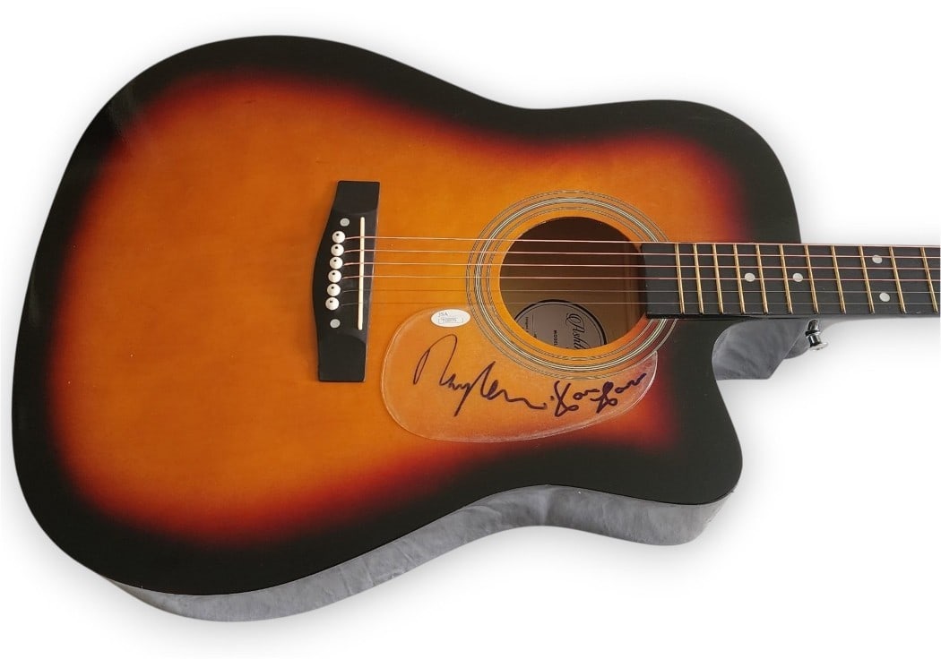 Autographed Acoustic Guitar Signed by Ray and Dave Davies JSA Authenticated: Autographed Acoustic Guitar Signed by Ray and Dave Davies JSA Authenticated This acoustic guitar and accompanying guitar pick are autographed by Ray Davies and Dave Davies of The Kinks. The signatures