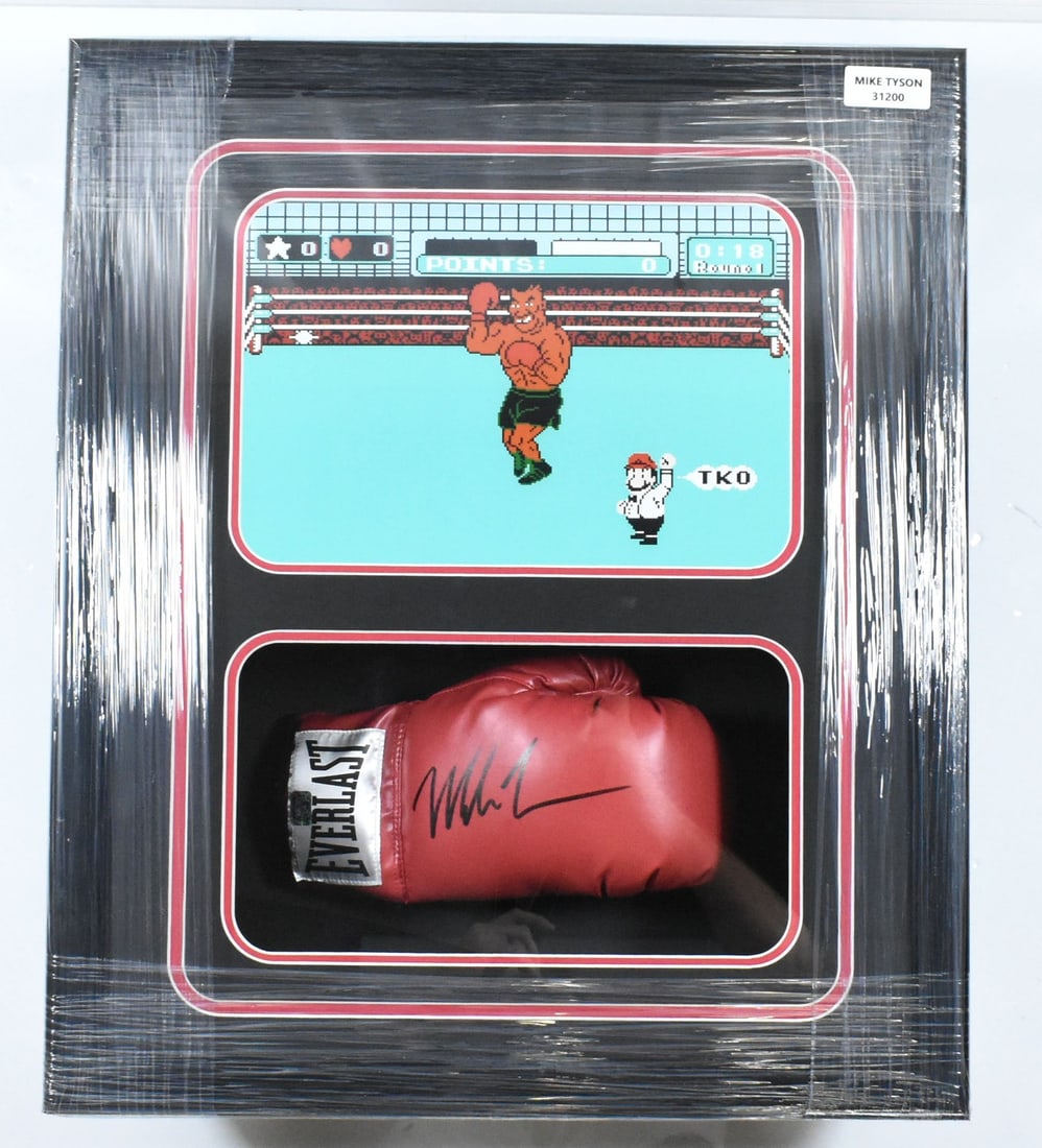 Shadow Box Display Red Everlast Glove Signed by Mike Tyson with Fiterman Holo: Shadow Box Display Red Everlast Glove Signed by Mike Tyson with Fiterman Holo This shadow box display features a red Everlast boxing glove that has been autographed by legendary boxer Mike Tyson. The