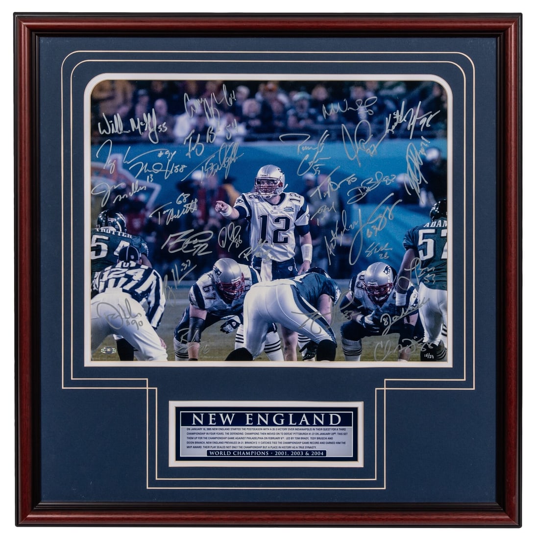 Tom Brady 2004 Super Bowl Champs Signed Photo Limited Edition 15/39 Steiner: Tom Brady 2004 Super Bowl Champs Signed Photo Limited Edition 15/39 Steiner Celebrate the unforgettable triumph of the 2004 New England Patriots with this stunning team-signed photograph. This limited