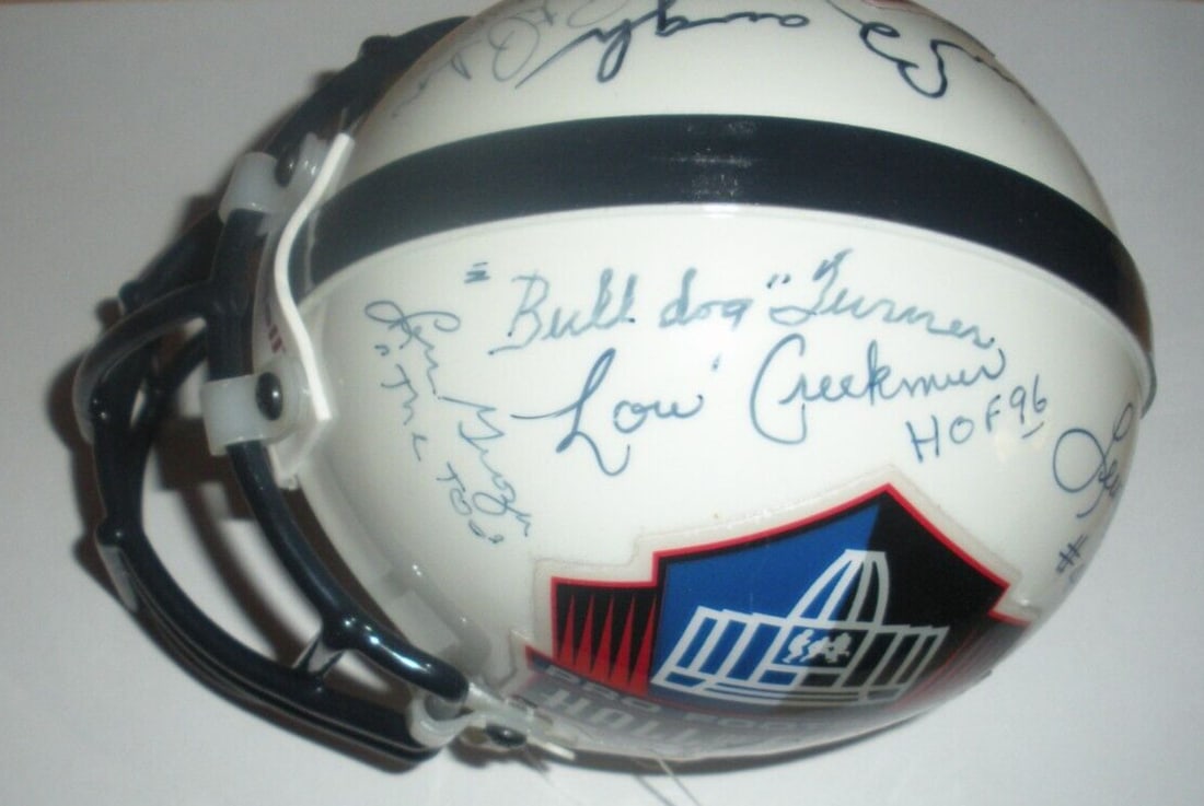 Mini Helmet Signed by Lou Groza Sammy Baugh Pete Pihos Plus Three JSA Authenticated: Mini Helmet Signed by Lou Groza Sammy Baugh Pete Pihos Plus Three JSA Authenticated This mini helmet has been hand-signed by Bulldog Turner, Lou Groza, Sammy Baugh, Pete Pihos, and three additional si