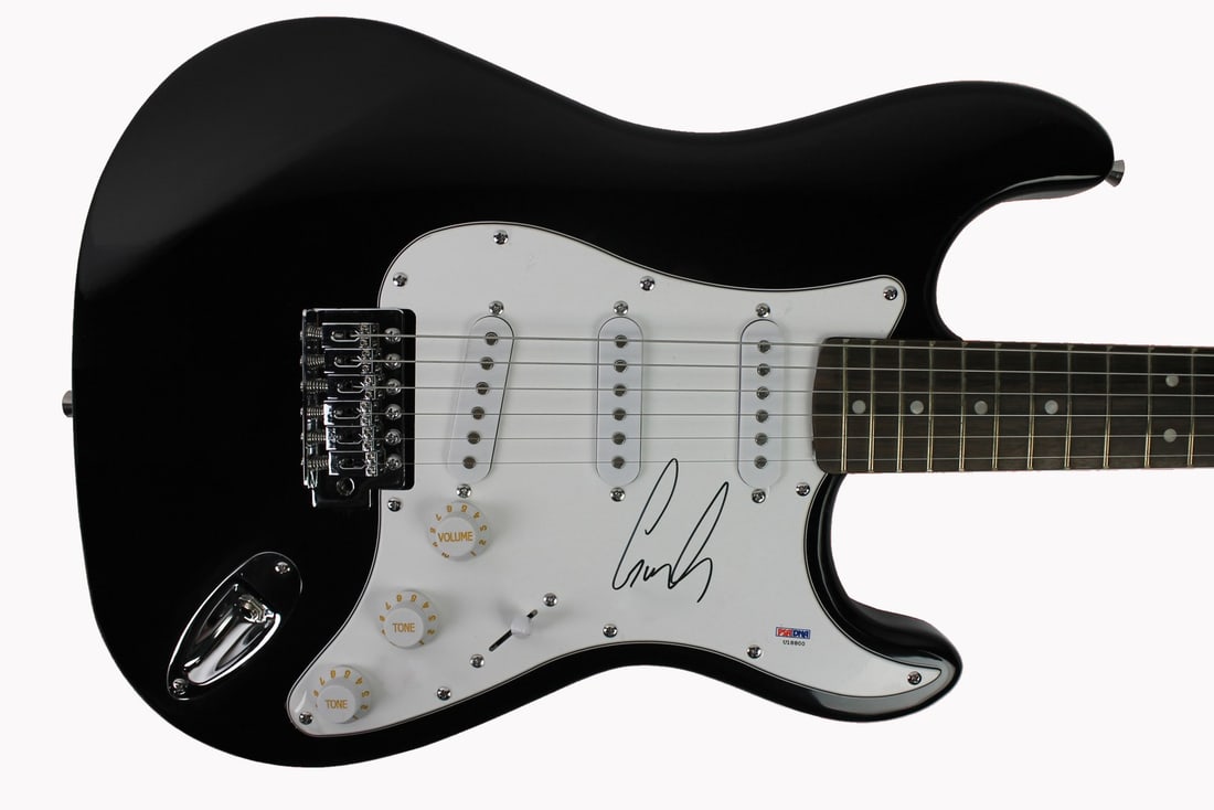 Gus G Firewind Signed Black Electric Guitar PSA Certified: Gus G Firewind Signed Black Electric Guitar PSA Certified This authentic black electric guitar has been personally signed by Gus G, the renowned guitarist of Firewind. The item is fully certified for