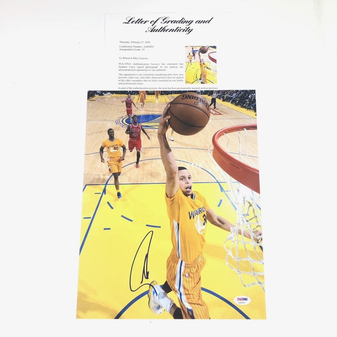 Stephen Curry Autographed 11x14 Photo PSA/DNA Grade 10 LOA: Stephen Curry Autographed 11x14 Photo PSA/DNA Grade 10 LOA Capture a piece of basketball history with this stunning 11x14 photograph of Stephen Curry, expertly autographed by the star player himself.