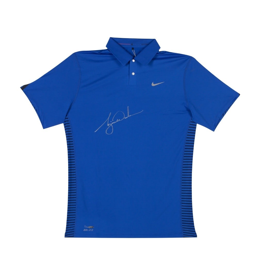 Tiger Woods Limited Edition Signed Nike Polo Golf Shirt /25: Tiger Woods Limited Edition Signed Nike Polo Golf Shirt /25 Own a piece of golf history with this limited edition Tiger Woods signed polo golf shirt from Nike. This royal blue shirt, autographed by th