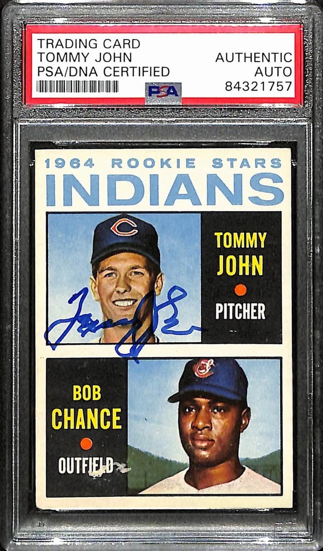 Tommy John Autographed 1964 Topps Rookie Card #146 PSA/DNA: Tommy John Autographed 1964 Topps Rookie Card #146 PSA/DNA This is a Tommy John autographed 1964 Topps Rookie card, number 146, featuring the Cleveland Indians. The autograph is authenticated by PSA/D