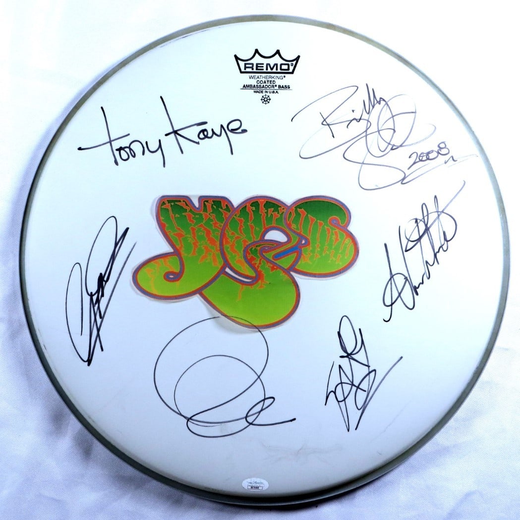 Yes Band Autographed 18 Drumhead with 6 Signatures JSA Certified: Yes Band Autographed 18 Drumhead with 6 Signatures JSA Certified This is an original autographed 18" drumhead from the iconic band Yes. It features the signatures of band members Tony Kaye, Geoff Down