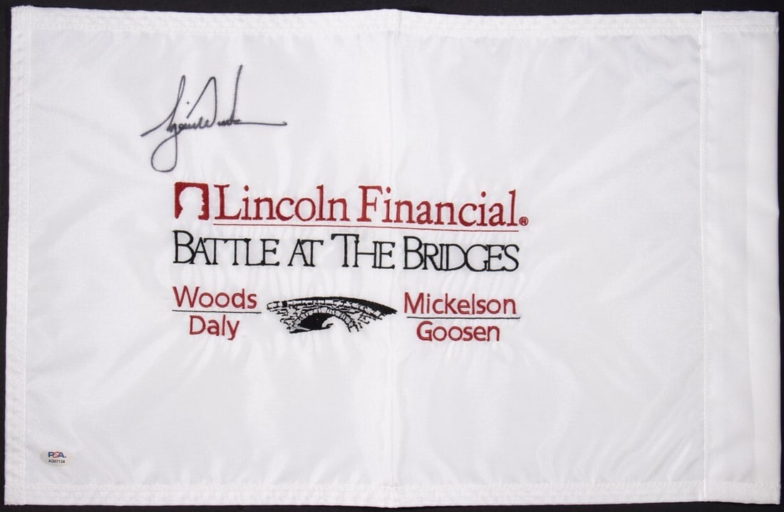 Tiger Woods Autographed PGA Golf Flag with PSA DNA Authentication: Tiger Woods Autographed PGA Golf Flag with PSA DNA Authentication This is an original autographed PGA golf flag signed by the legendary golfer Tiger Woods. The signature is prominently displayed benea