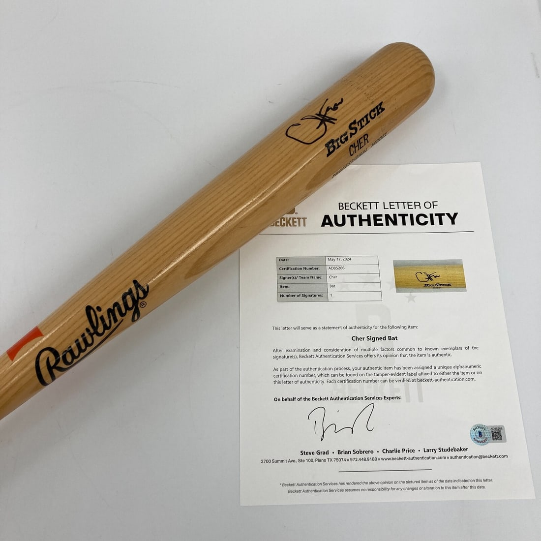 Cher Signed Rawlings Baseball Bat with Beckett COA Rare Investment: Cher Signed Rawlings Baseball Bat with Beckett COA Rare Investment This is a rare Cher signed personal model Rawlings baseball bat, authenticated by Beckett. The bat features Cher's bold autograph in