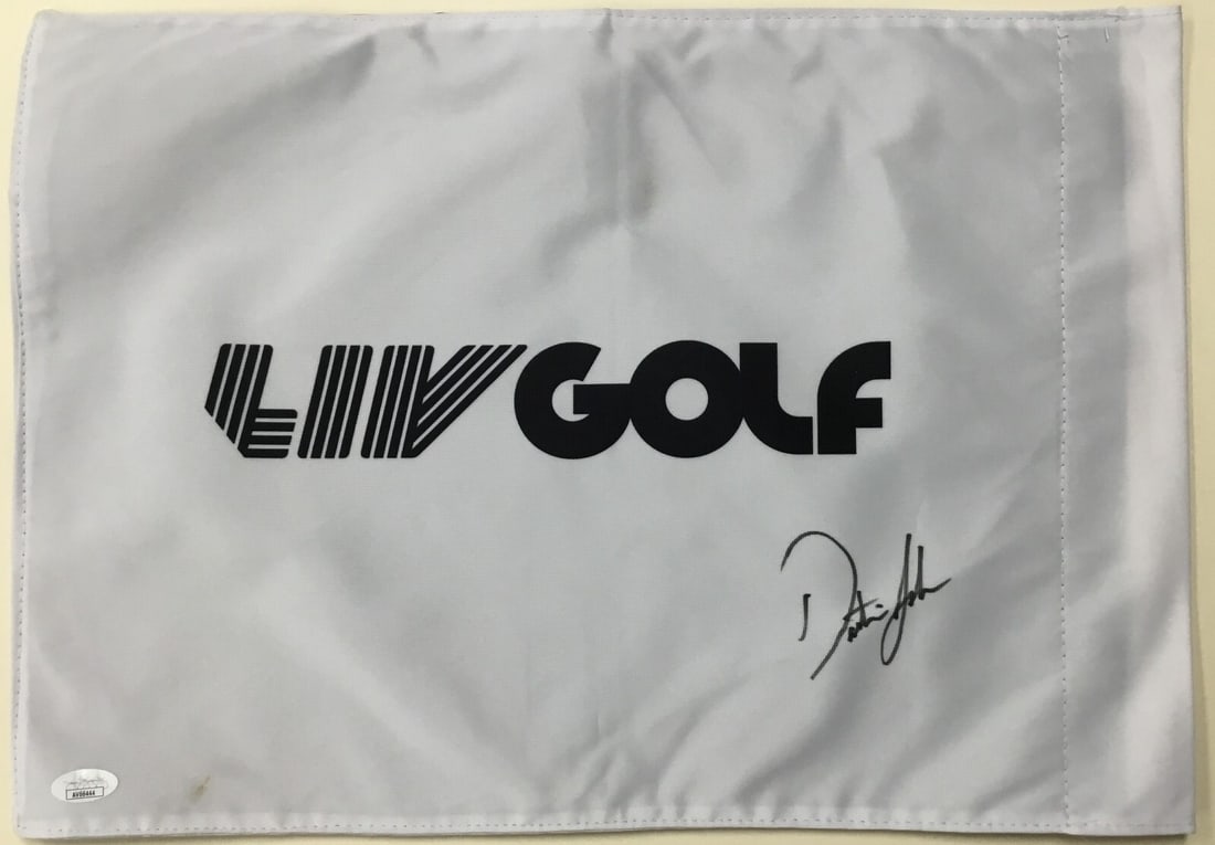 Dustin Johnson LIV 18 Signed Flag with JSA Authentication: Dustin Johnson LIV 18 Signed Flag with JSA Authentication This is an official LIV 18 pin flag, signed by PGA star Dustin Johnson. The autograph is authenticated by James Spence Authentication (JSA) wi