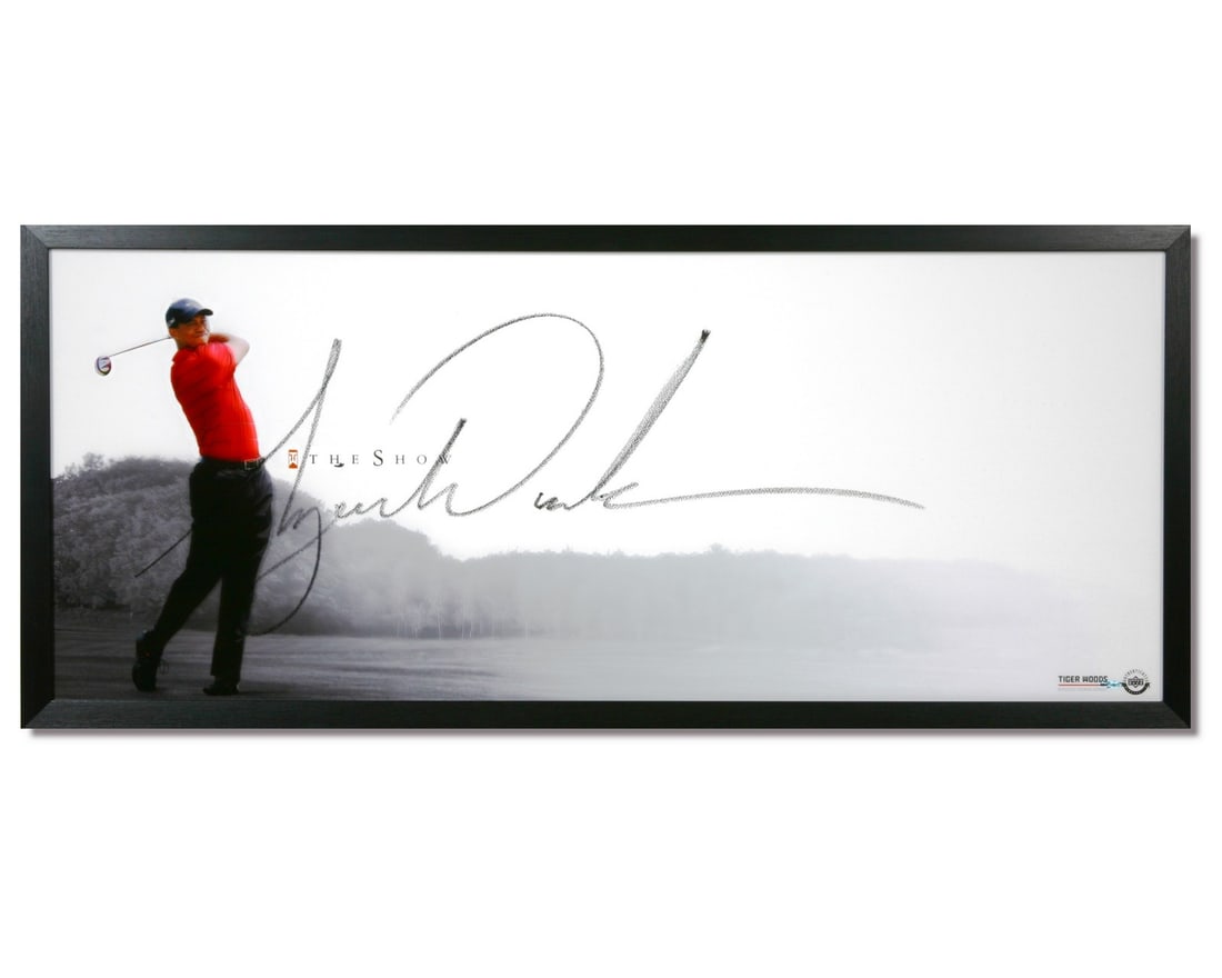 46x20 Framed Photo Signed by Tiger Woods with Upper Deck Authentication: 46x20 Framed Photo Signed by Tiger Woods with Upper Deck Authentication This framed photo titled "The Show" features a large, authentic signature from legendary golfer Tiger Woods. Measuring 46 by 20