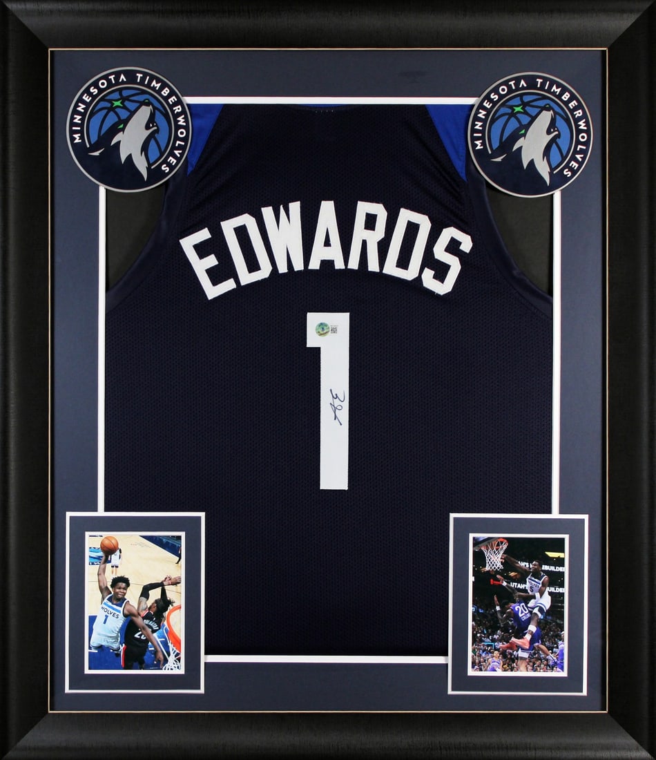 Framed Navy Pro Jersey Signed by Anthony Edwards Beckett Authenticated: Framed Navy Pro Jersey Signed by Anthony Edwards Beckett Authenticated This professionally framed navy blue pro style jersey has been personally signed by Anthony Edwards of the Minnesota