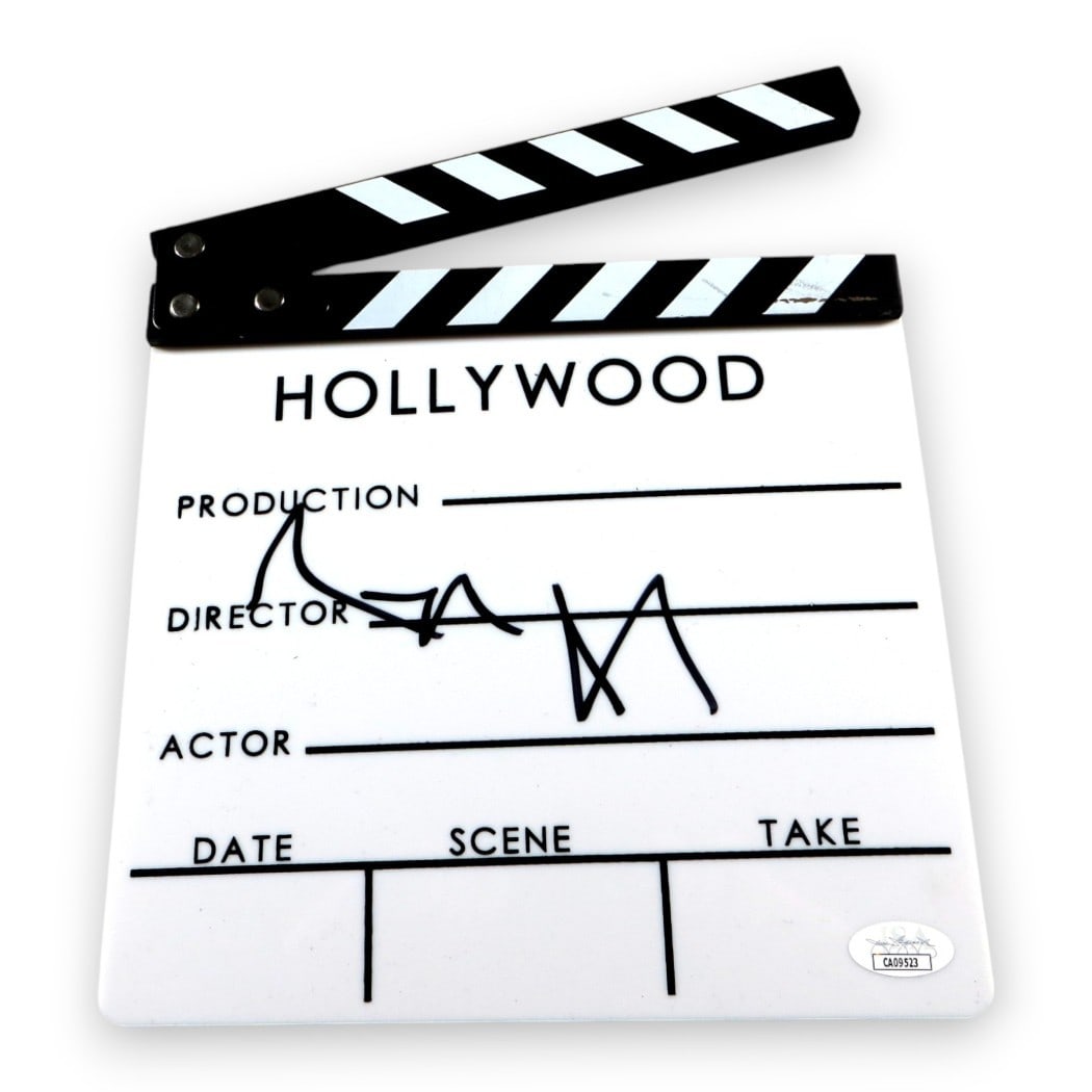 Angelina Jolie Signed Clapper Tomb Raider Eternals JSA Authenticated: Angelina Jolie Signed Clapper Tomb Raider Eternals JSA Authenticated This authentic movie clapper, signed by Angelina Jolie, showcases a piece of cinematic history. It comes with a certification of