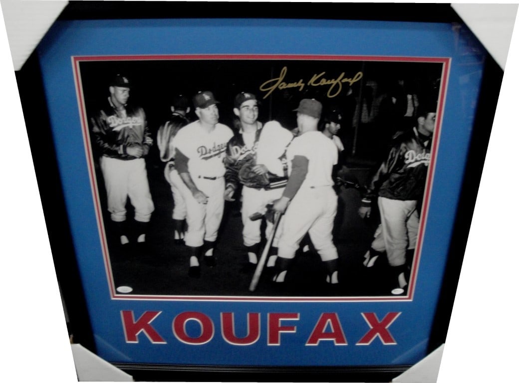 Sandy Koufax Autographed 16x20 Framed Photo Celebrating Dodgers Win JSA Authenticated: Sandy Koufax Autographed 16x20 Framed Photo Celebrating Dodgers Win JSA Authenticated Celebrate the legacy of baseball legend Sandy Koufax with this stunning autographed 16" x 20" photograph, capturin