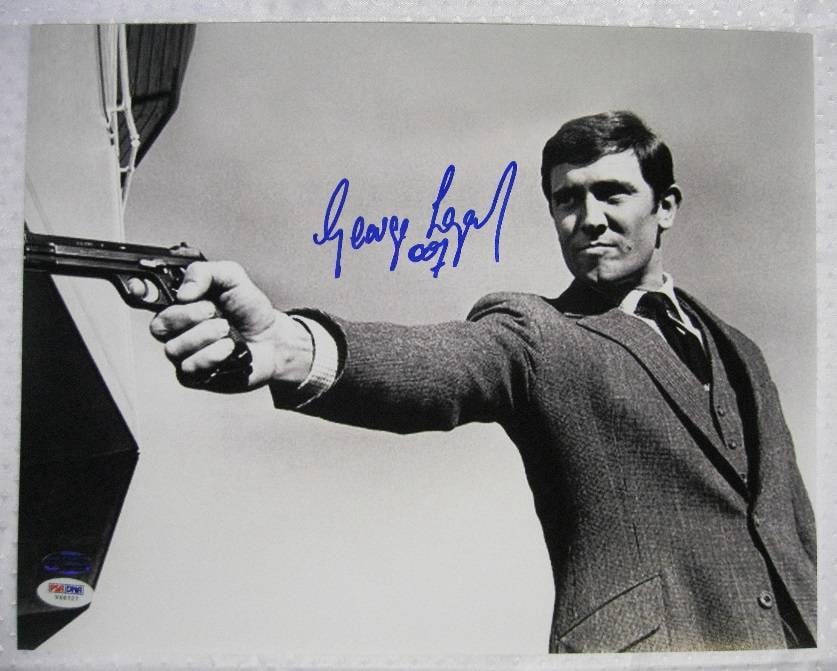 16x20 James Bond Photograph Signed by George Lazenby PSA DNA Authenticated: 16x20 James Bond Photograph Signed by George Lazenby PSA DNA Authenticated This is an original 16x20 photograph hand signed by George Lazenby, known for his role as James Bond. The autograph is authen