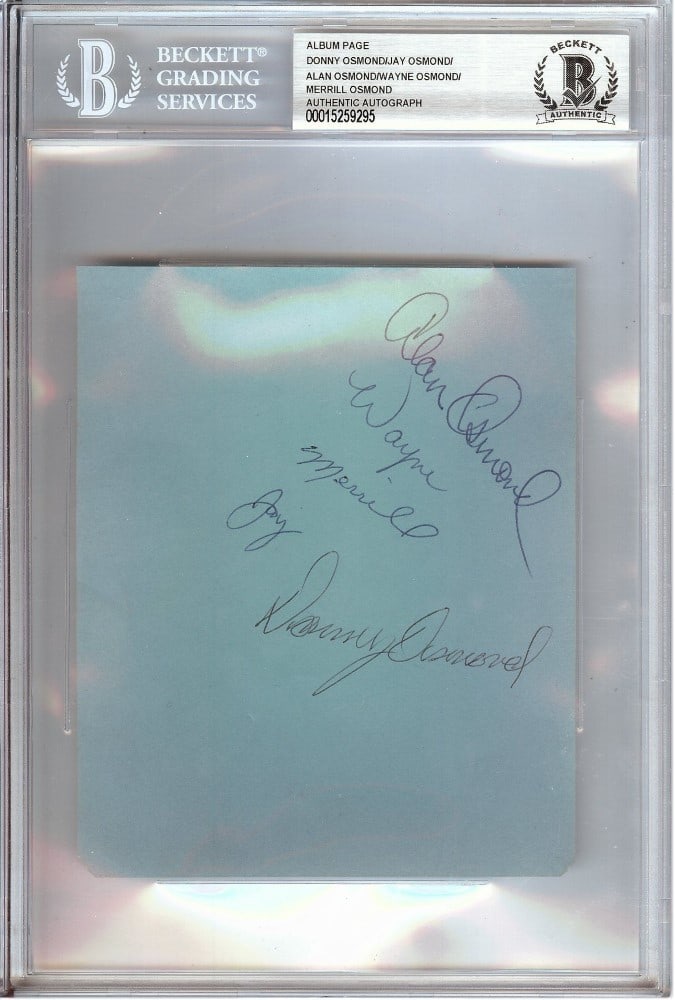 The Osmonds Autographed Album Page Signed by Donny Jay Wayne Beckett Authenticated: The Osmonds Autographed Album Page Signed by Donny Jay Wayne Beckett Authenticated This is an original autographed album page featuring the signatures of Donny, Jay, Wayne, Merrill, and Alan Osmond. T