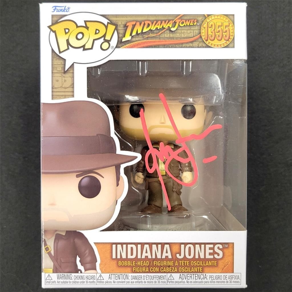 Indiana Jones Funko Pop 1355 autographed by Harrison Ford Beckett authenticated: Indiana Jones Funko Pop 1355 autographed by Harrison Ford Beckett authenticated This collectible Indiana Jones Funko Pop Figure #1355 features the authentic autograph of Harrison Ford. The signature i
