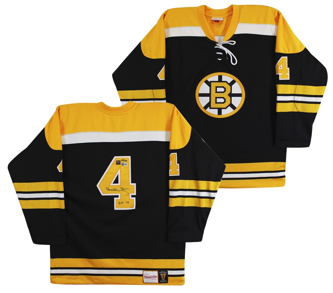 Autographed Black Mitchell & Ness Bruins Jersey Bobby Orr HOF 79 Inscription BAS GNR: Autographed Black Mitchell & Ness Bruins Jersey Bobby Orr HOF 79 Inscription BAS GNR This black vintage Mitchell & Ness throwback jersey is personally signed by Bobby Orr of the Boston Bruins, featuri