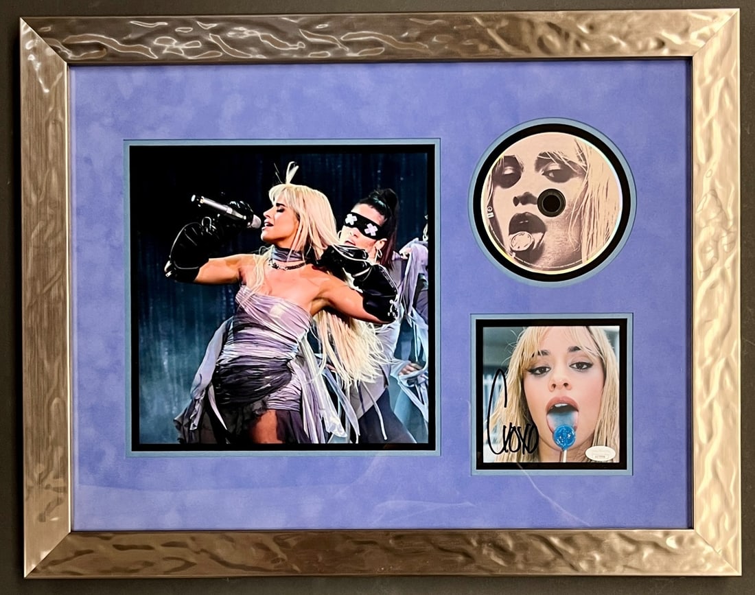Camilla Cabello Signed CD Insert Custom Framed Display JSA Authenticated: Camilla Cabello Signed CD Insert Custom Framed Display JSA Authenticated This stunning custom framed display features a signed CD insert from pop star Camilla Cabella, complete with her signature "C,