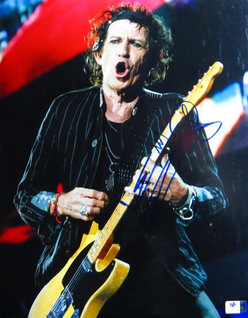 Keith Richards Autographed 11x14 Photo The Rolling Stones GAI Certified: Keith Richards Autographed 11x14 Photo The Rolling Stones GAI Certified This is an authentic 11x14 photograph signed by Keith Richards, the legendary guitarist of The Rolling Stones. The photograph sh