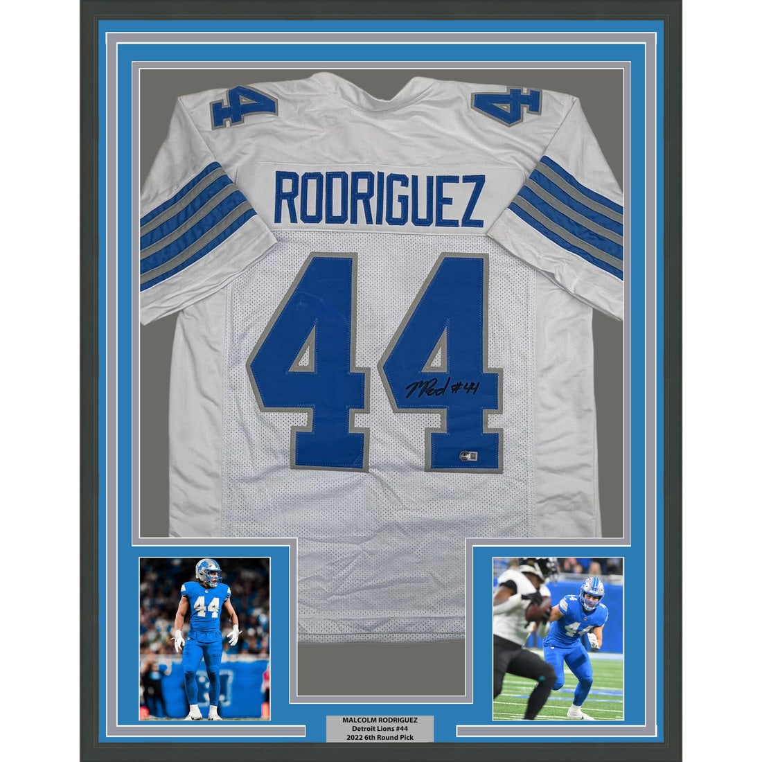 Malcolm Rodriguez Detroit Lions White Jersey Framed Signed Display with BAS COA: Malcolm Rodriguez Detroit Lions White Jersey Framed Signed Display with BAS COA This professionally framed and matted display features a Detroit Lions white jersey autographed by Malcolm Rodriguez. Th