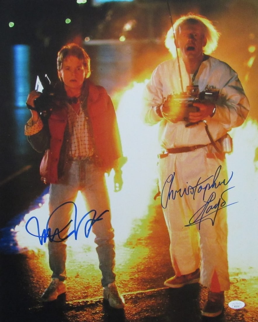 Autographed 16x20 Michael J Fox Christopher Lloyd Back to the Future Photo JSA: Autographed 16x20 Michael J Fox Christopher Lloyd Back to the Future Photo JSA This striking 16x20 photo features the iconic duo Michael J. Fox and Christopher Lloyd, both of whom have signed it, cele