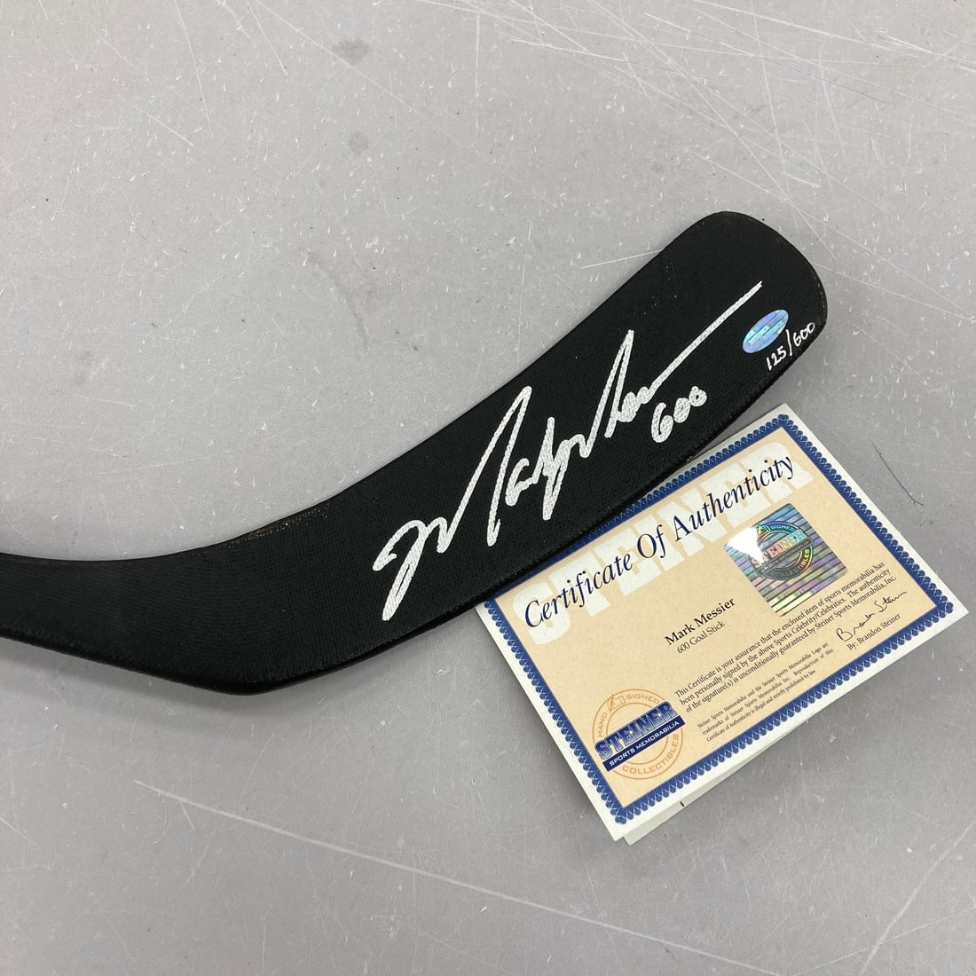 Autographed Mark Messier 600th Goal Hockey Stick with Steiner Sports COA: Autographed Mark Messier 600th Goal Hockey Stick with Steiner Sports COA This is a Mark Messier autographed 600th Goal commemorative hockey stick, signed on the blade with a gold and silver marker. Th