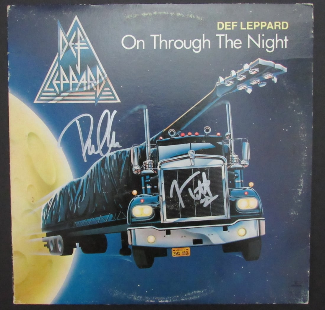 Def Leppard Joe Elliott Phil Collen Dual-Signed Album On Through the Night JSA Authenticated: Def Leppard Joe Elliott Phil Collen Dual-Signed Album On Through the Night JSA Authenticated Offered is an original, dual-signed album by Def Leppard featuring signatures from band members Joe Elliott