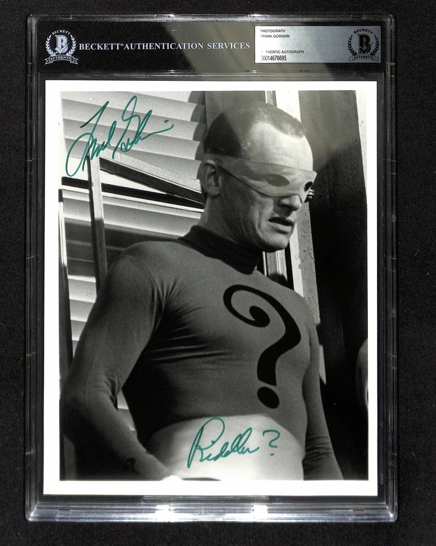 8x10 Photo Signed by Frank Gorshin as Riddler Beckett Auto Grade 10: 8x10 Photo Signed by Frank Gorshin as Riddler Beckett Auto Grade 10 This is an original 8x10 black and white photograph signed by Frank Gorshin, known for his portrayal of the Riddler in Batman. The a