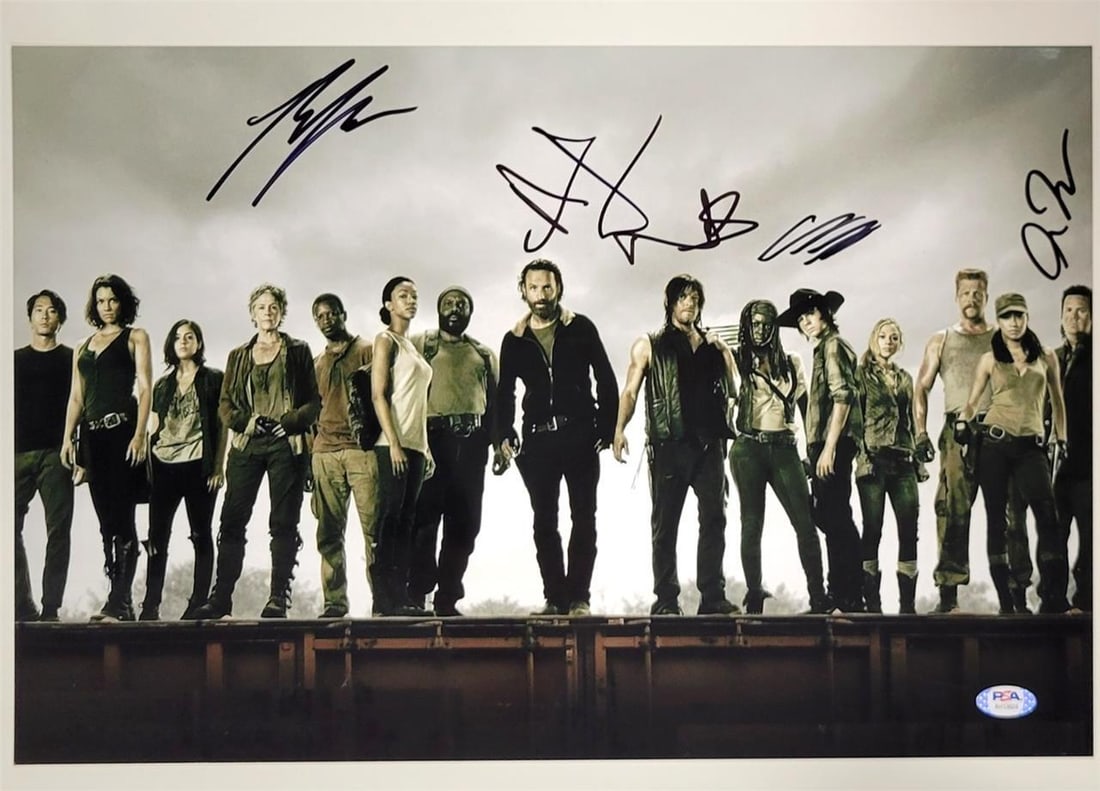 The Walking Dead Cast Signed 12x18 Photo with PSA Authentication: The Walking Dead Cast Signed 12x18 Photo with PSA Authentication Capture a piece of television history with this signed 12x18 photo from the iconic series The Walking Dead. This original photograph fe