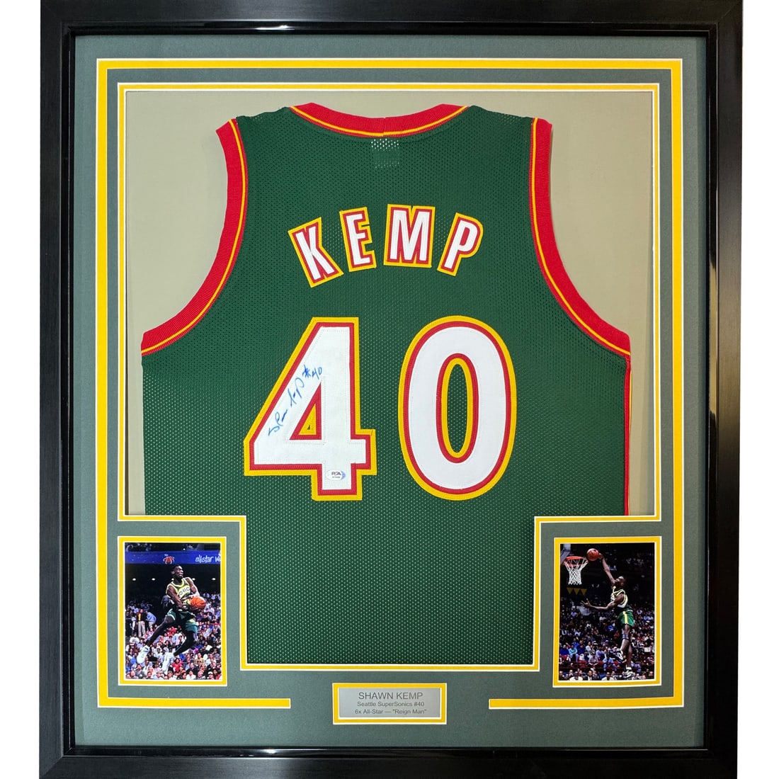 Framed Autographed Shawn Kemp Seattle SuperSonics Jersey PSA/DNA COA: Framed Autographed Shawn Kemp Seattle SuperSonics Jersey PSA/DNA COA Celebrate the legacy of Shawn Kemp with this stunning framed autographed Seattle SuperSonics jersey. Measuring 33"x42", this Dark