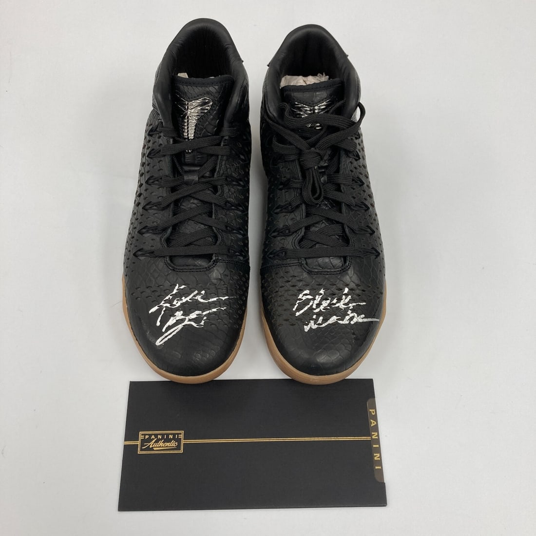 Kobe Bryant Signed Nike Kobe IX Mid EXT Sneakers with Black Mamba Inscription: Kobe Bryant Signed Nike Kobe IX Mid EXT Sneakers with Black Mamba Inscription This listing features a pair of Nike Kobe IX Mid EXT sneakers, personally signed by the legendary NBA Hall of Famer Kobe B
