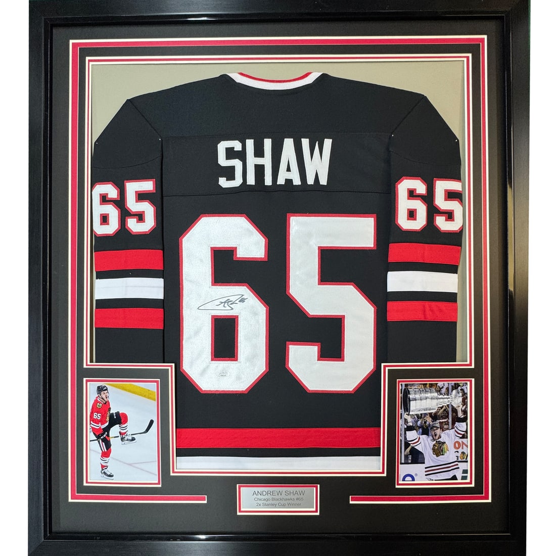 Framed Andrew Shaw Autographed Chicago Blackhawks Jersey with JSA COA: Framed Andrew Shaw Autographed Chicago Blackhawks Jersey with JSA COA Celebrate the Chicago Blackhawks with this professionally framed, autographed Andrew Shaw hockey jersey. This stunning piece measu