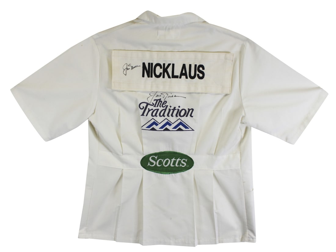 Jack Nicklaus Signed 2x The Tradition Caddy Bib Shirt Beckett COA: Jack Nicklaus Signed 2x The Tradition Caddy Bib Shirt Beckett COA This authentic caddy bib shirt is a remarkable collector's item featuring two signatures from legendary golfer Jack Nicklaus. Personal