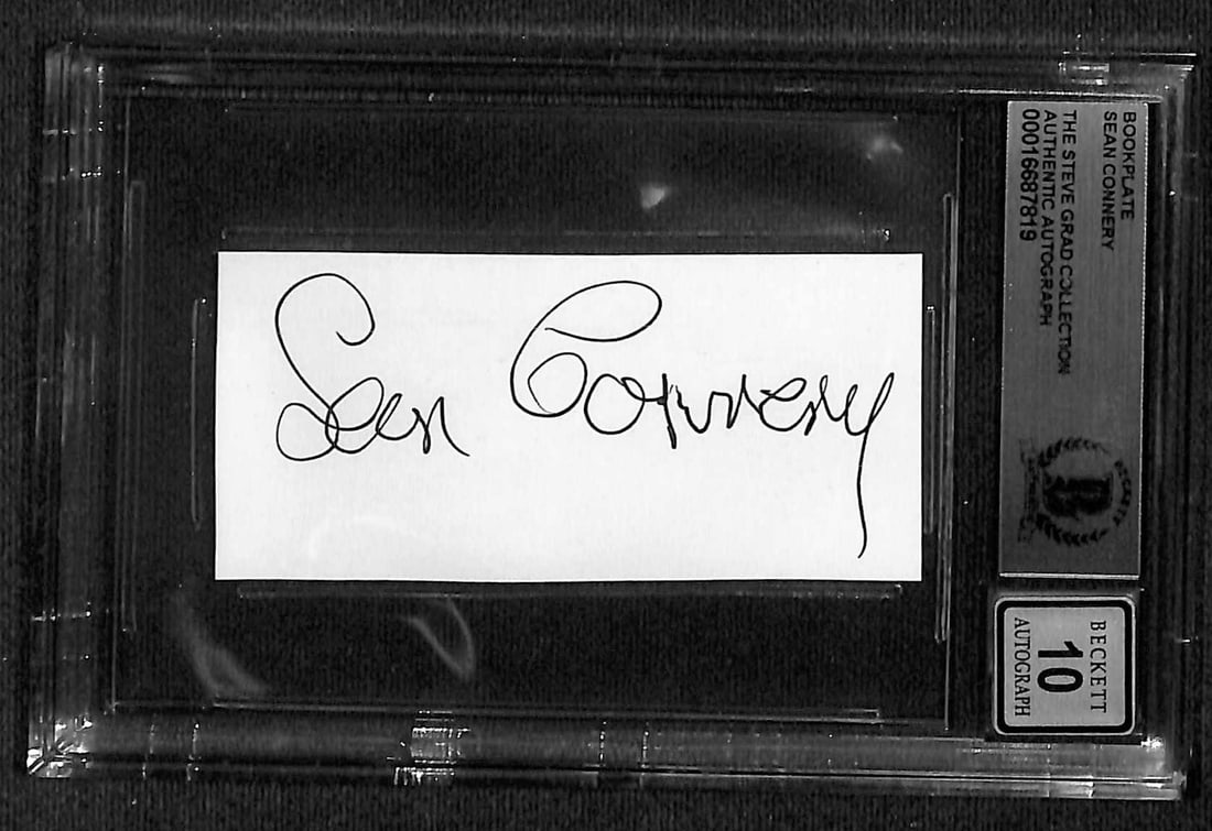 Sean Connery Signed Bookplate Beckett Certified James Bond Autograph: Sean Connery Signed Bookplate Beckett Certified James Bond Autograph This signed bookplate features a bold black ink autograph from the legendary Sir Sean Connery, encapsulated and certified authentic