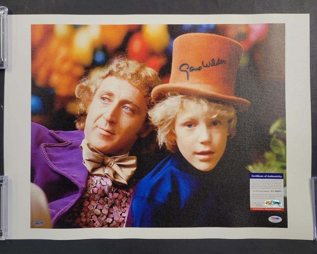 Gene Wilder Autographed 16x20 Willy Wonka Photo PSA/DNA COA: Gene Wilder Autographed 16x20 Willy Wonka Photo PSA/DNA COA This is a stunning 16x20 canvas photo featuring Gene Wilder's iconic portrayal of Willy Wonka from the beloved film 'Willy Wonka and the Cho