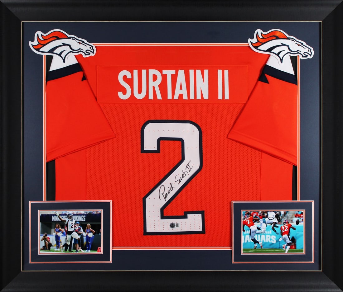Framed Orange Jersey Signed by Patrick Surtain II with Beckett Authentication: Framed Orange Jersey Signed by Patrick Surtain II with Beckett Authentication This authentic orange pro-style jersey has been personally signed by Patrick Surtain II of the Denver Broncos. The jersey