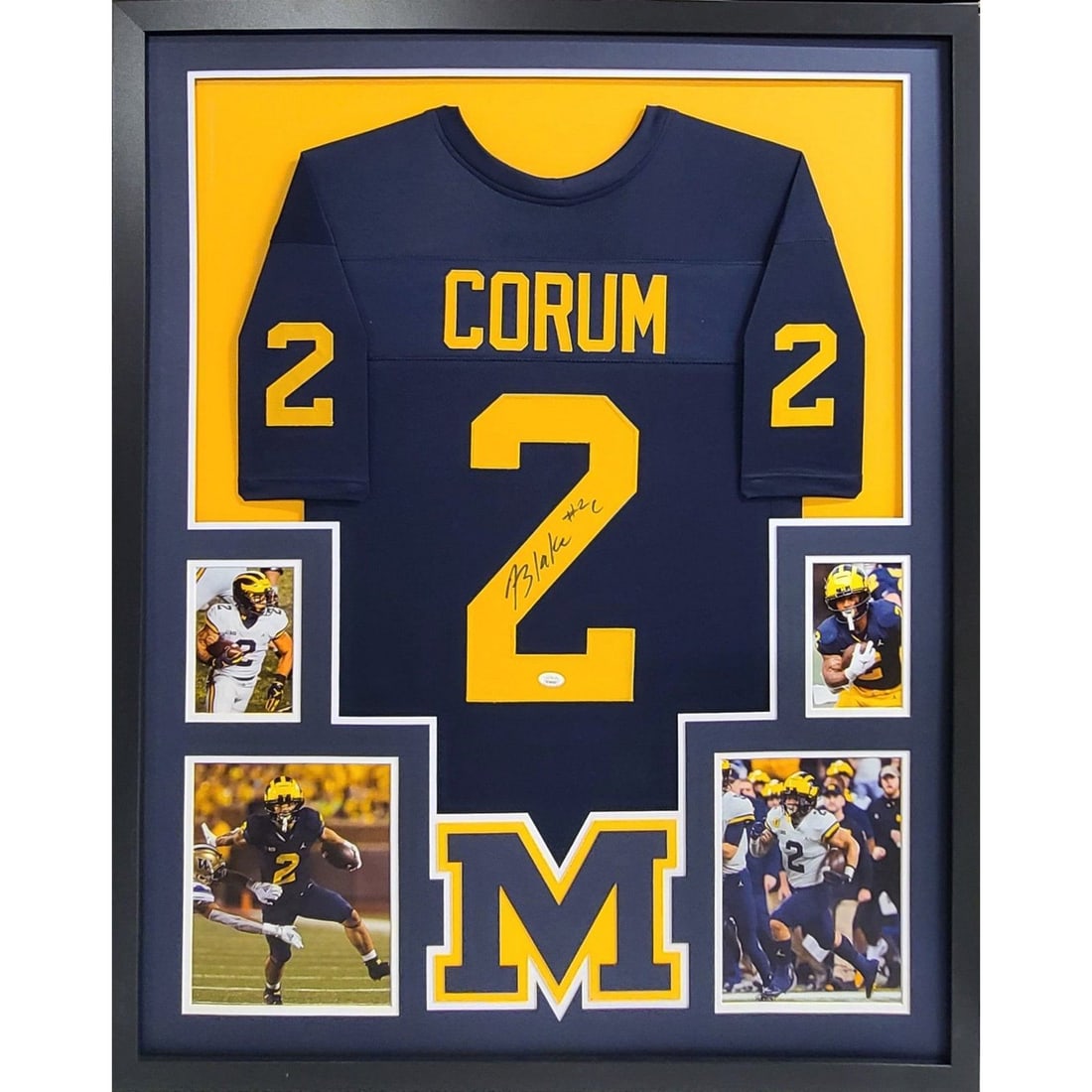 Framed Michigan Football Jersey Signed by Blake Corum with JSA Authentication: Framed Michigan Football Jersey Signed by Blake Corum with JSA Authentication This is an original framed Michigan football jersey autographed by Blake Corum. The jersey comes with JSA authentication a