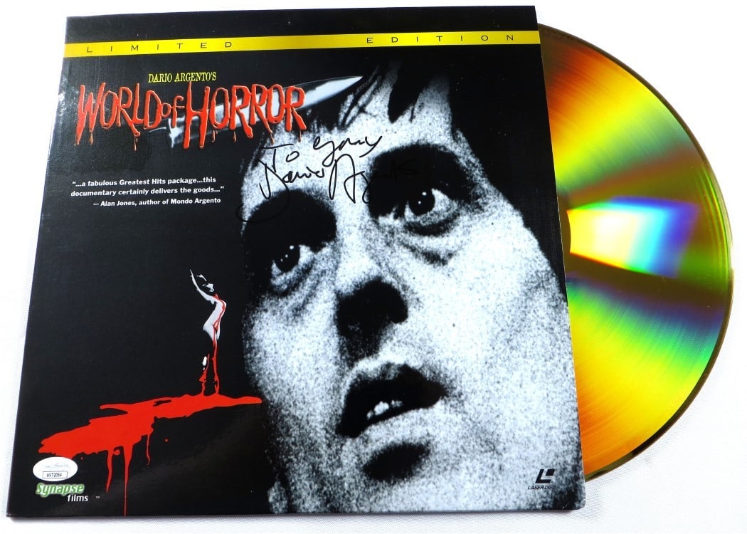 Dario Argento Autographed Laserdisc Cover JSA Certified Original: Dario Argento Autographed Laserdisc Cover JSA Certified Original This authentic Dario Argento Signed Laserdisc Cover features the legendary filmmaker's autograph, authenticated by James Spence Authent