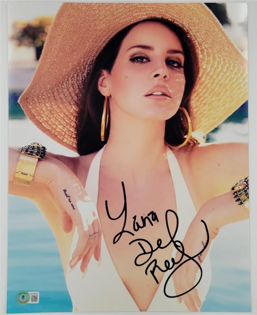 11x14 Lana Del Rey autographed photo authenticated by Beckett BAS: 11x14 Lana Del Rey autographed photo authenticated by Beckett BAS This original 11x14 photograph features a full autograph by singer Lana Del Rey. The item is authenticated by Beckett BAS and is in pr
