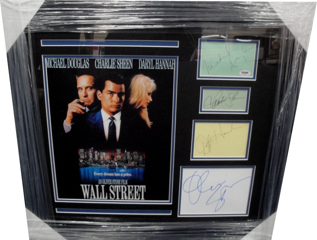 Wall Street Framed Collage Signed by Stone Sheen Douglas Hannah Beckett Authenticated: Wall Street Framed Collage Signed by Stone Sheen Douglas Hannah Beckett Authenticated This stunning Wall Street collage features the authentic signatures of renowned personalities Oliver Stone, Charli