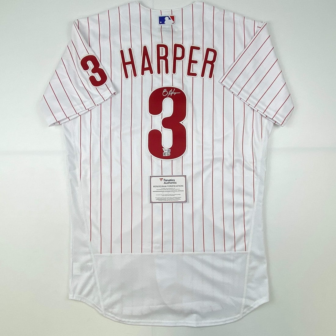 Bryce Harper Signed Phillies Pinstripe Jersey with Fanatics COA: Bryce Harper Signed Phillies Pinstripe Jersey with Fanatics COA This is an authentic, autographed Bryce Harper Philadelphia Phillies pinstripe jersey, certified by Fanatics Authentic. The jersey repre