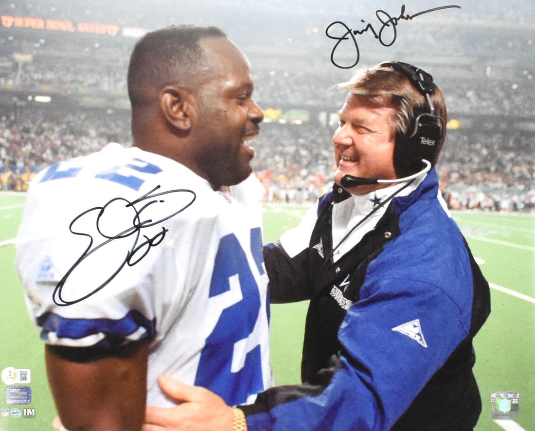 Dallas Cowboys 16x20 Photo Signed by Emmitt Smith and Jimmy Johnson Beckett Hologram: Dallas Cowboys 16x20 Photo Signed by Emmitt Smith and Jimmy Johnson Beckett Hologram This 16x20 celebration photo features the authentic signatures of Emmitt Smith and Jimmy Johnson, commemorating the