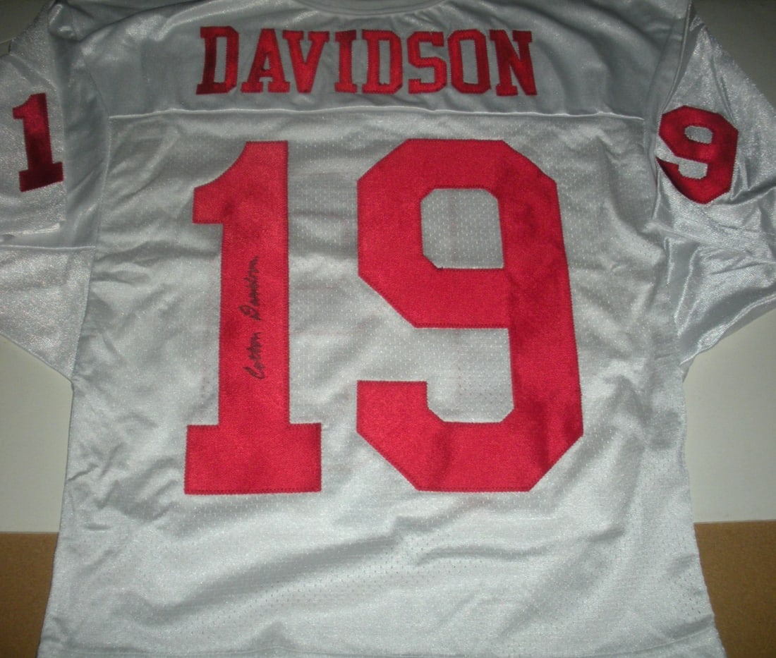 Rare Signed Dallas Texans Wilson Jersey with COA: Rare Signed Dallas Texans Wilson Jersey with COA This official licensed Wilson jersey features the cotton construction of the Dallas Texans, a rare find for football enthusiasts. It comes with a Certi