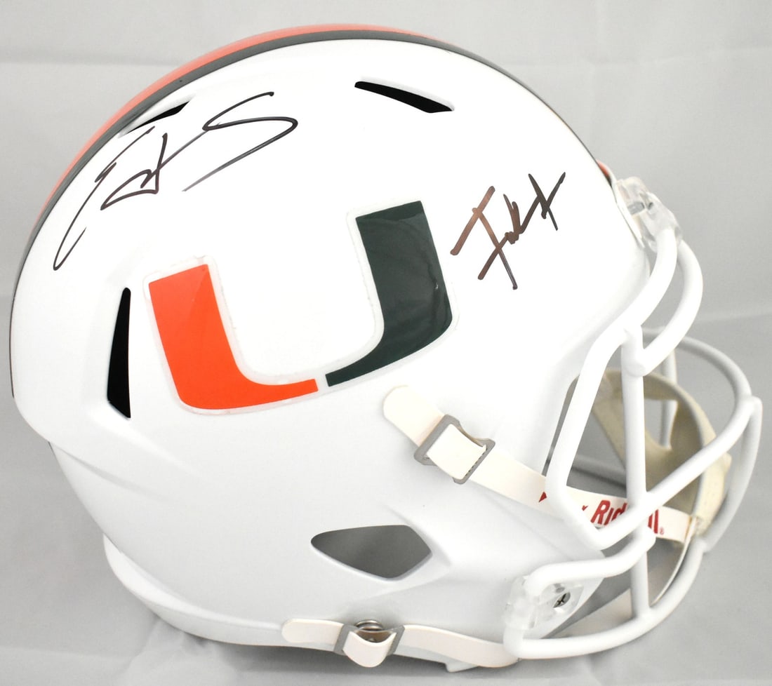 Miami Hurricanes Speed Helmet Signed by Edgerrin James and Frank Gore Beckett Holo: Miami Hurricanes Speed Helmet Signed by Edgerrin James and Frank Gore Beckett Holo This Miami Hurricanes full-size Speed helmet features signatures from Edgerrin James and Frank Gore. It is an origina
