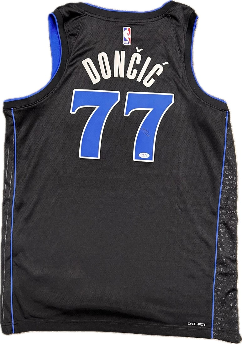 Luka Doncic Autographed Swingman Jersey PSA/DNA Authentic Mavericks: Luka Doncic Autographed Swingman Jersey PSA/DNA Authentic Mavericks This is an original swingman jersey autographed by Luka Doncic, the star player of the Dallas Mavericks. The signed jersey comes wit
