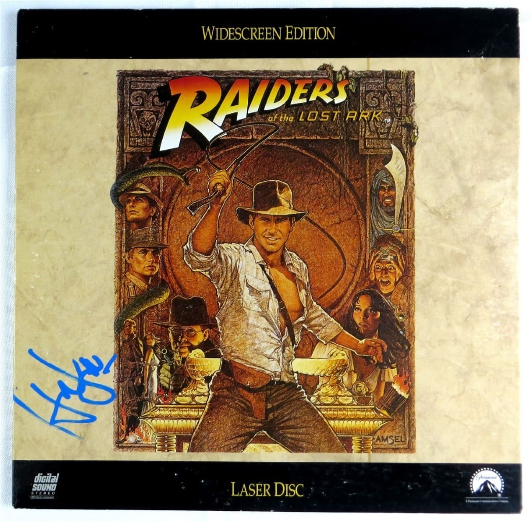 Harrison Ford Autographed Laserdisc Cover Raiders of the Lost Ark Beckett Authenticated: Harrison Ford Autographed Laserdisc Cover Raiders of the Lost Ark Beckett Authenticated This is an original autographed laserdisc cover of 'Raiders of the Lost Ark,' personally signed by Harrison Ford