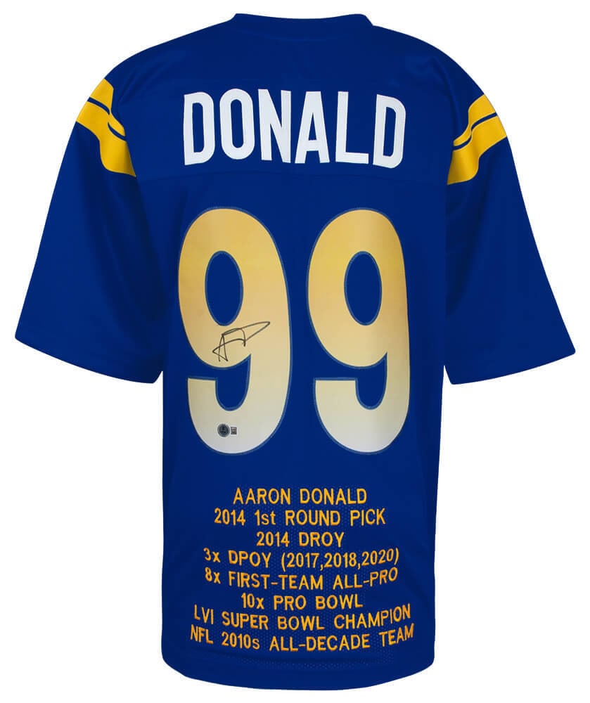 Aaron Donald Signed Blue Jersey Los Angeles Rams Beckett COA: Aaron Donald Signed Blue Jersey Los Angeles Rams Beckett COA This is an original, pre-owned blue custom embroidered football jersey signed by NFL star Aaron Donald, featuring his statistics and accola